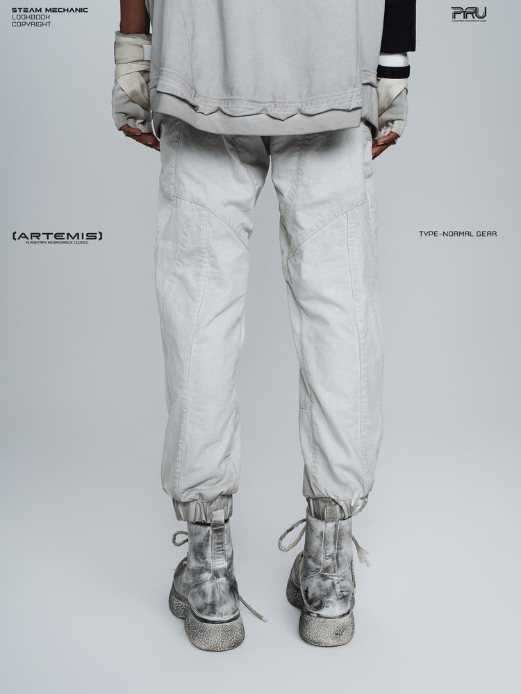 AEGIS eris white cropped moto riding pants — back modeled view with gathered cuffs