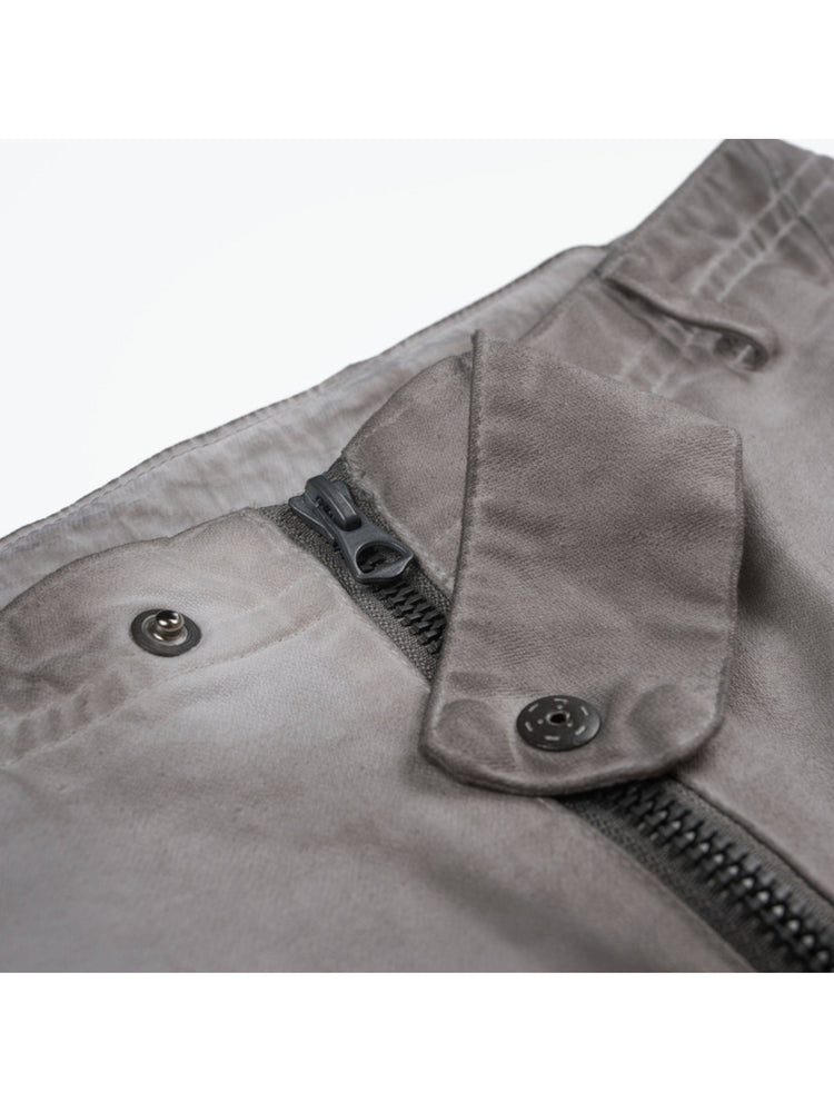 AEGIS eris white cropped moto riding pants — close-up of the snap waistband and zipper fly