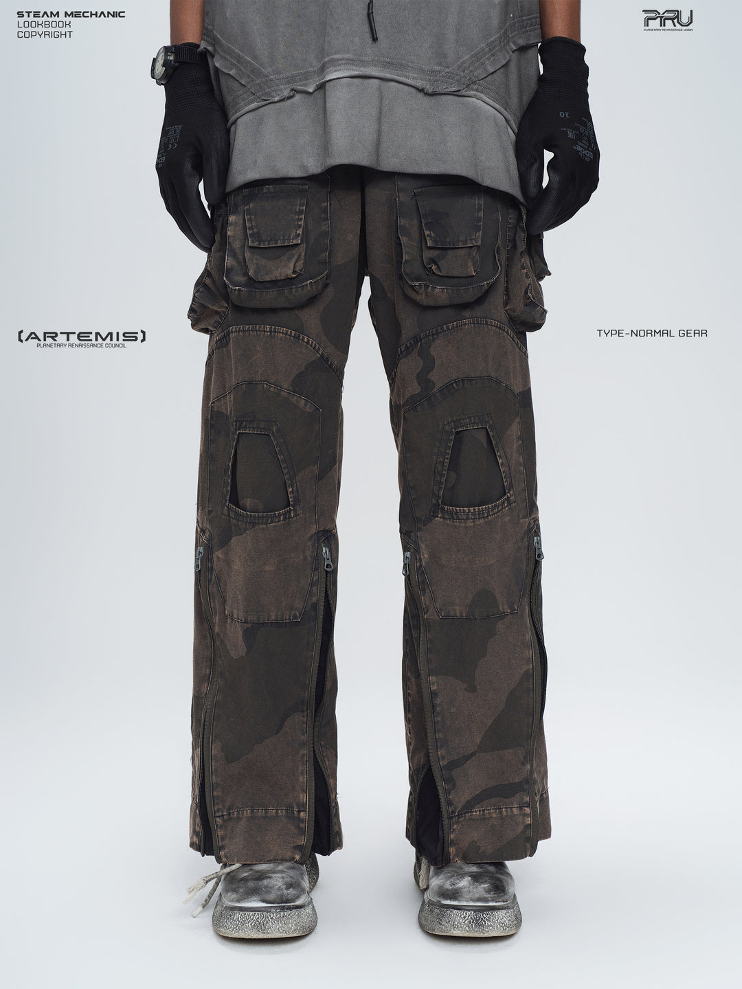 IXION dead leaf brown washed camouflage combat pants — front lower-body modeled view showing layered cargo pockets