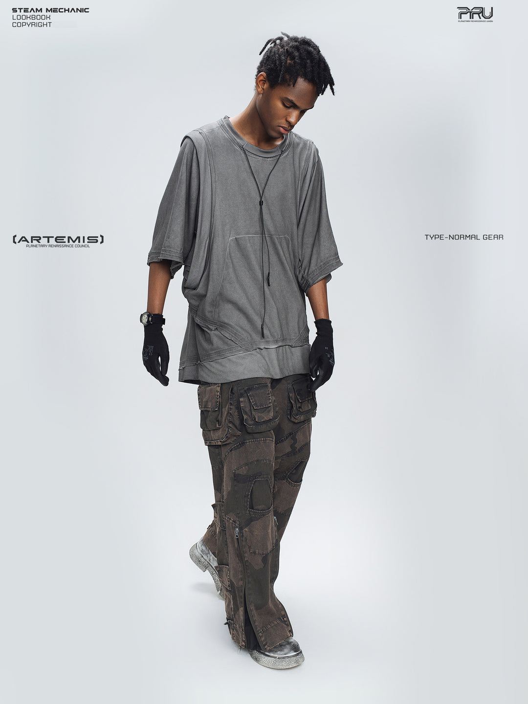 IXION dead leaf brown washed camouflage combat pants — full-length three-quarter modeled view looking down