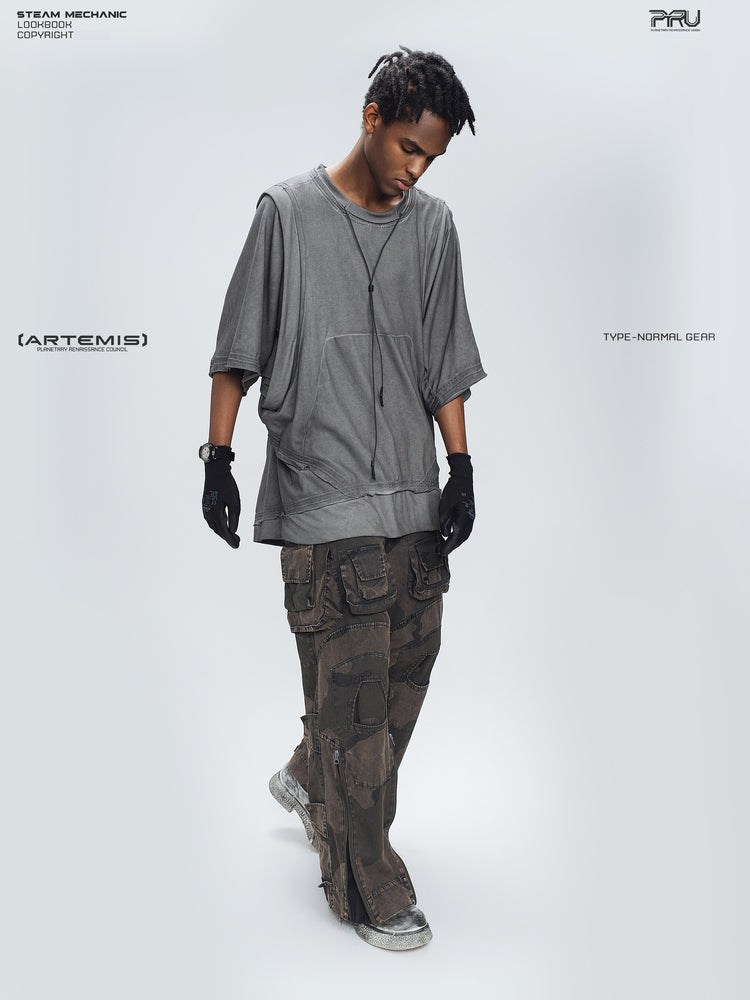 IXION dead leaf brown washed camouflage combat pants — full-length three-quarter modeled view looking down