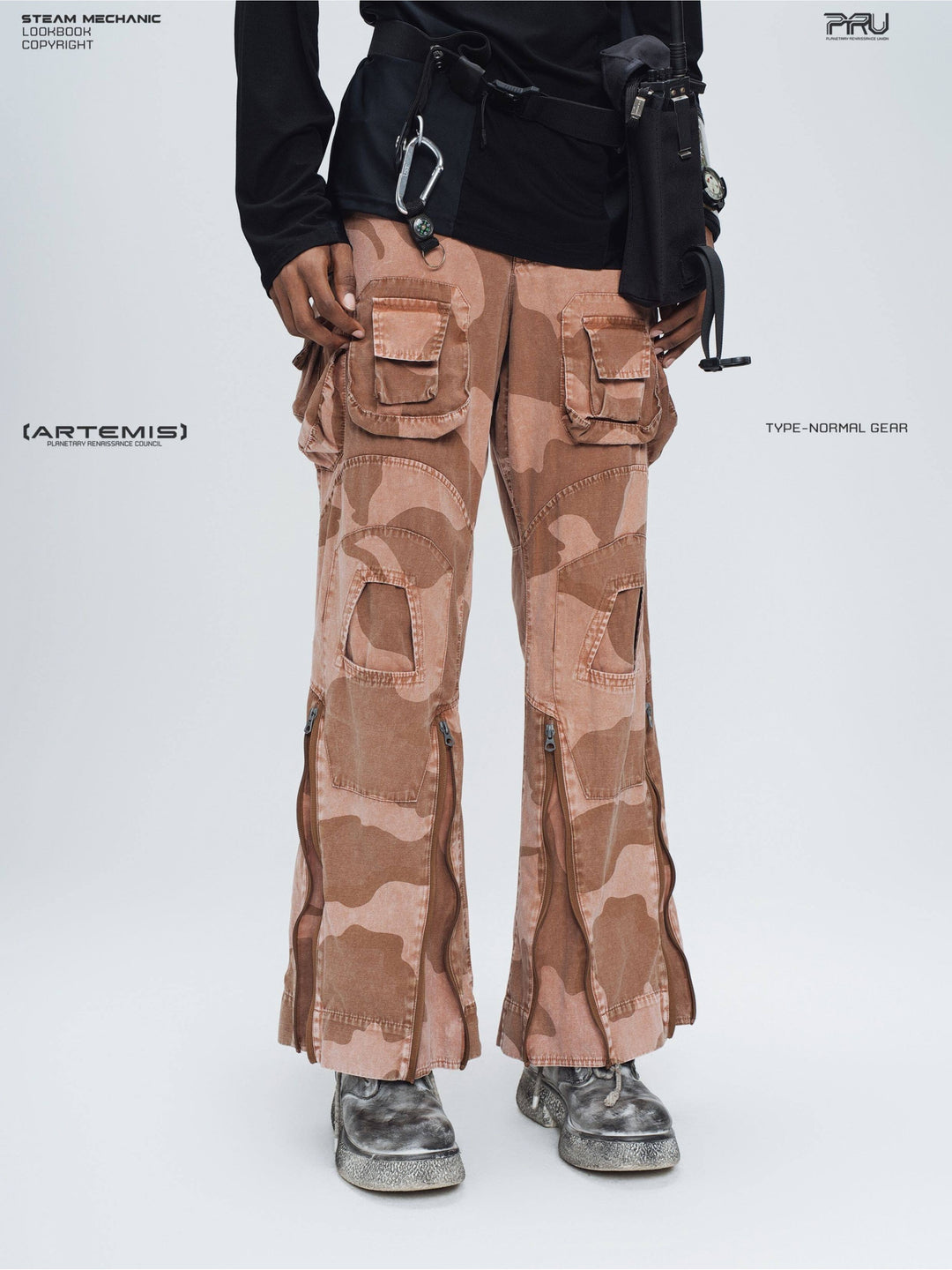 IXION washed camouflage combat pants in dune red — close modeled three-quarter front view