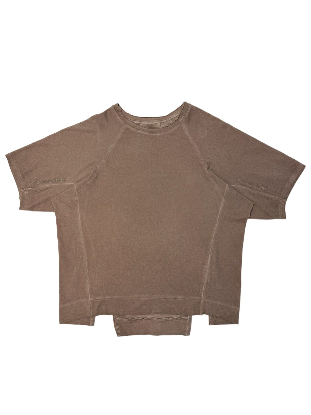 ERODED SPINE distressed asymmetric tee — wasteland vine brown front flat lay showing the distressed panel construction