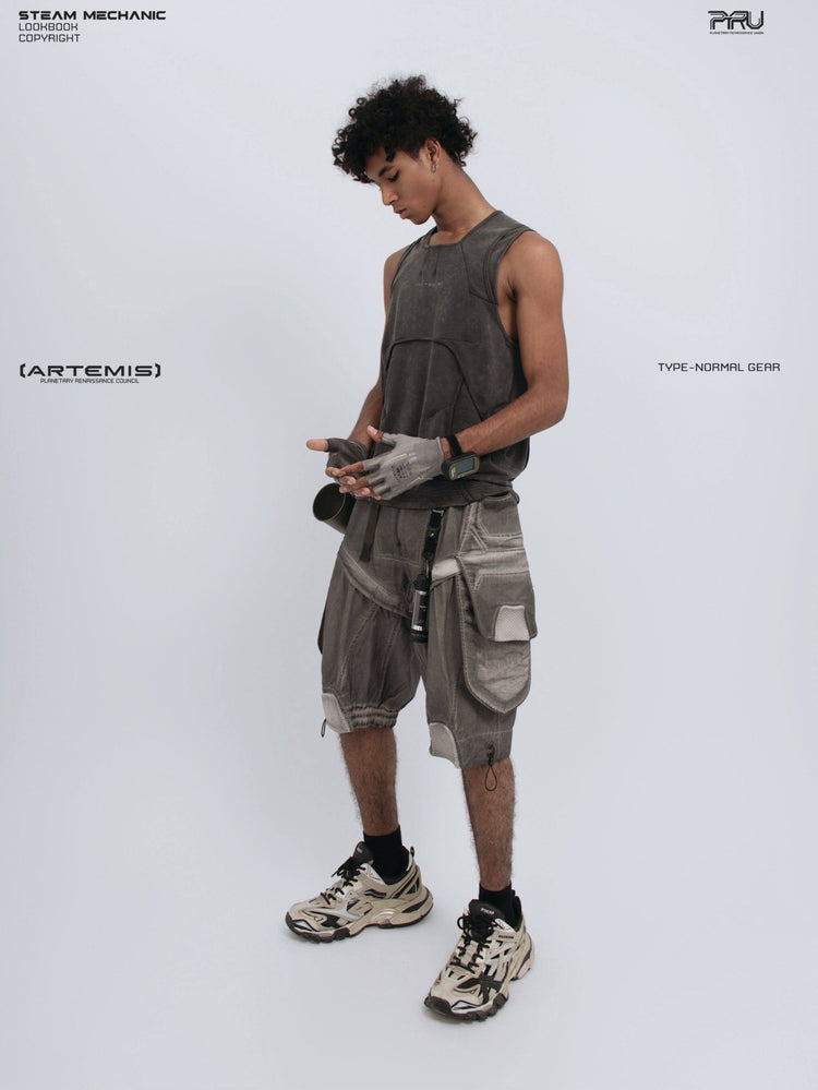 RIFT ARC deconstructed tank in washed gray — side three-quarter modeled view while adjusting gloves