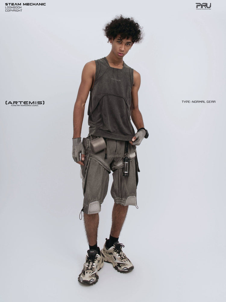 RIFT ARC deconstructed tank in washed gray — full-length front modeled view holding the hem