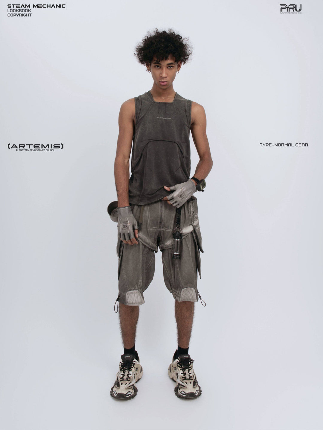 RIFT ARC deconstructed tank in washed gray — front modeled view holding one side of the hem