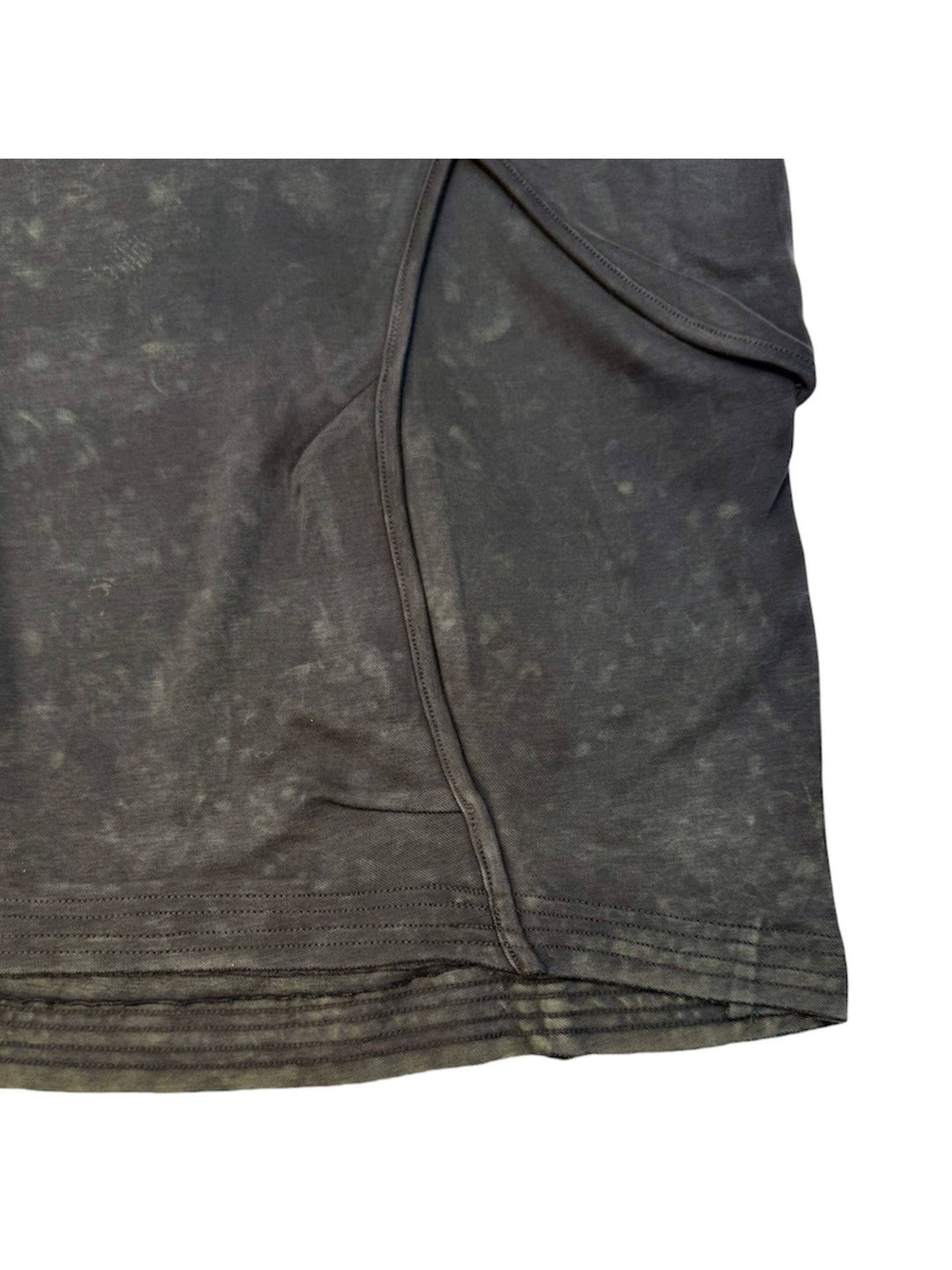 RIFT ARC deconstructed tank in washed gray — close-up of curved seams and hem stitching