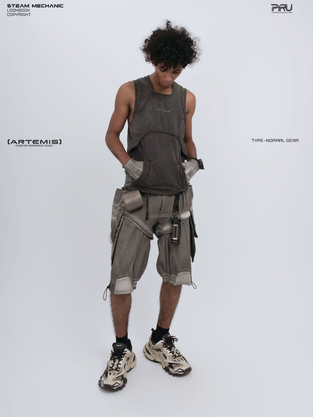 RIFT ARC deconstructed tank in washed gray — full-length front modeled view with hands in pockets