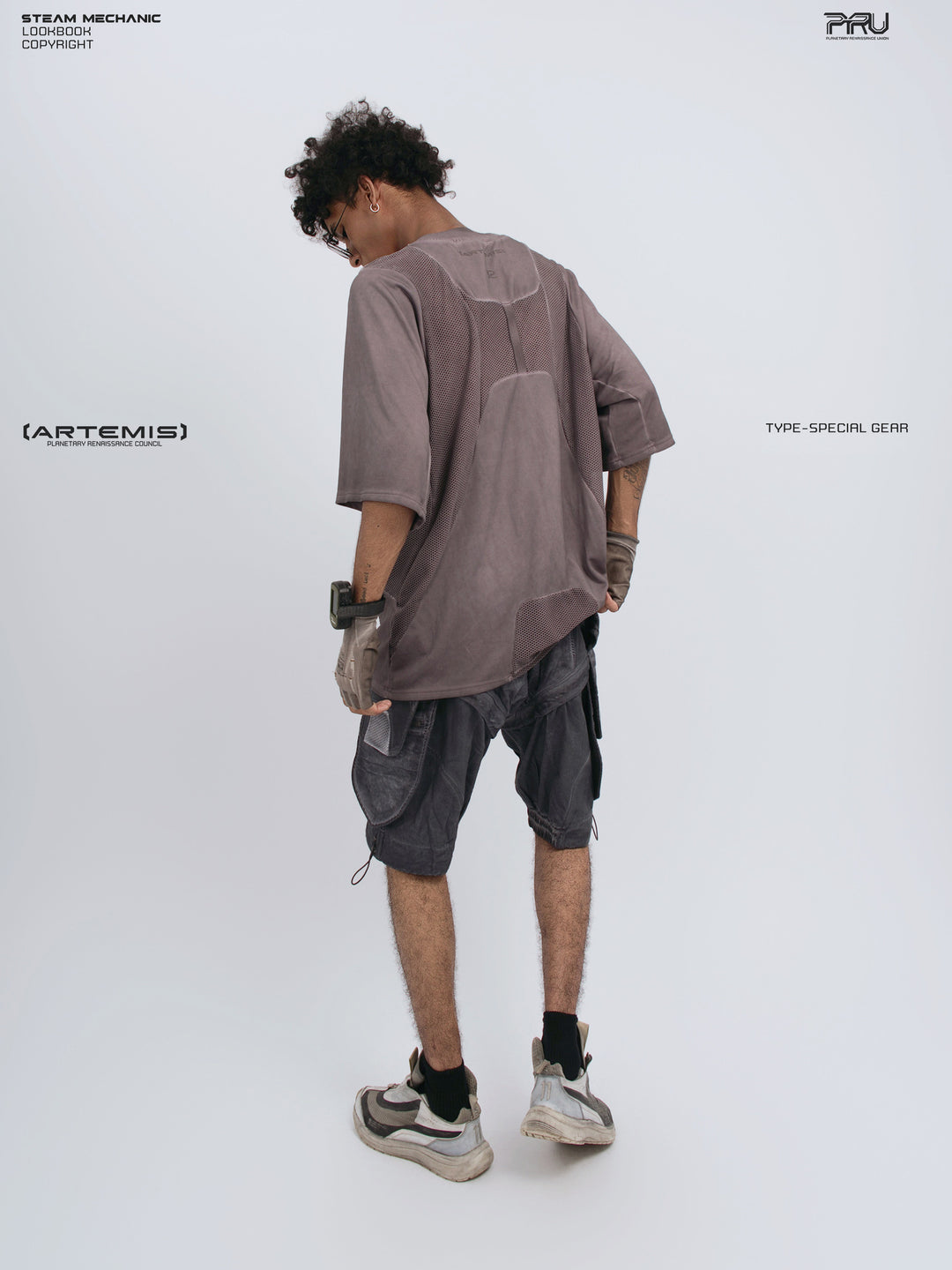 STARFIELD WELDER dust mist purple distressed mesh tee — full-length rear three-quarter view with the hem held out