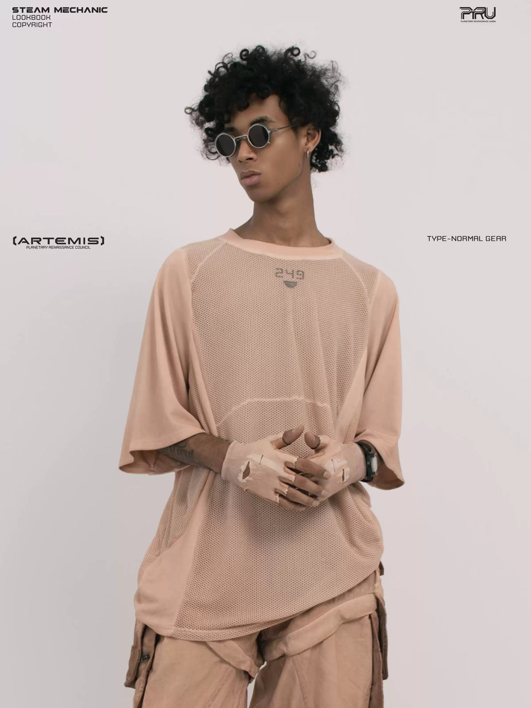 STARFIELD WELDER soft dawn orange distressed mesh tee — three-quarter modeled close-up with hands clasped