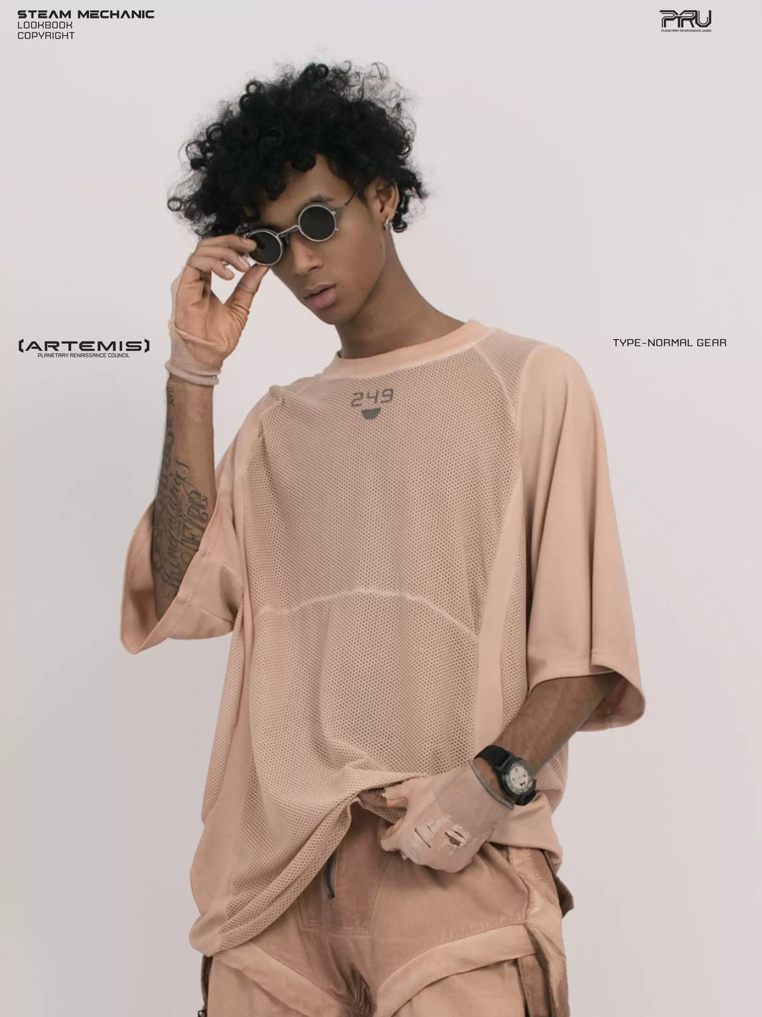 STARFIELD WELDER soft dawn orange distressed mesh tee — front modeled close-up adjusting sunglasses