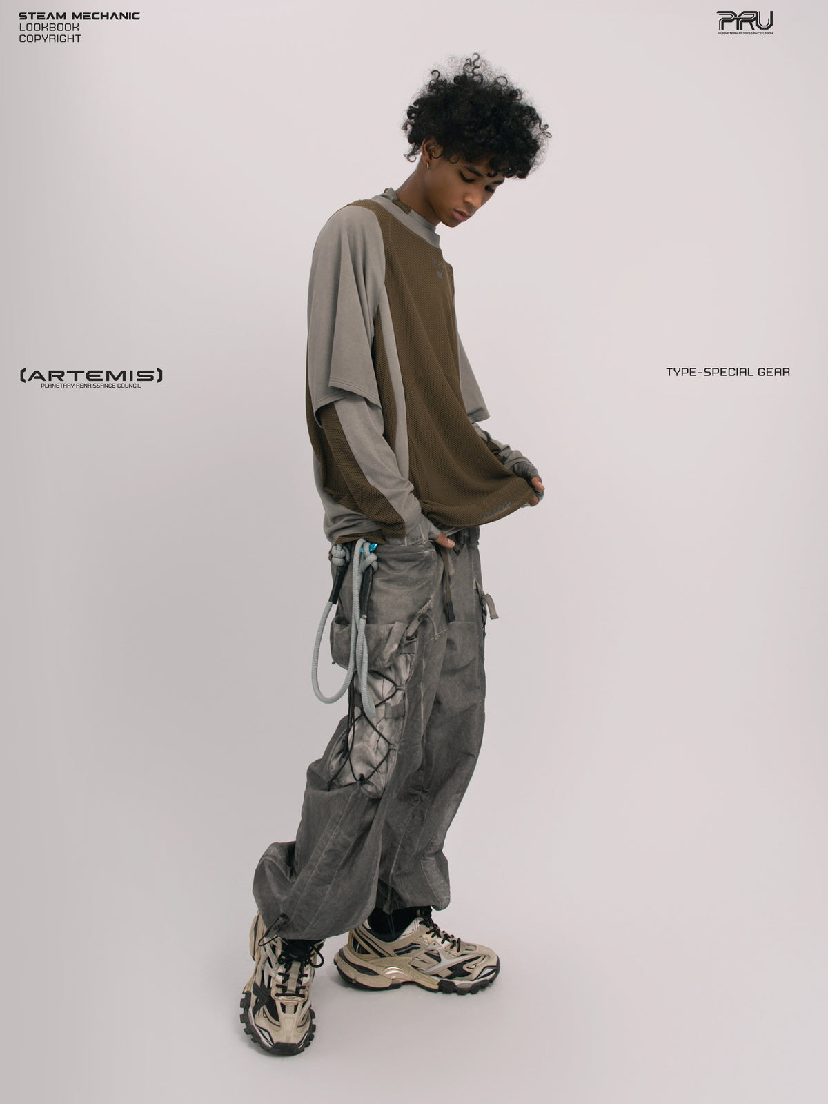 STARFIELD WELDER steel tundra distressed mesh tee — full-length side-front view layered over a long-sleeve top