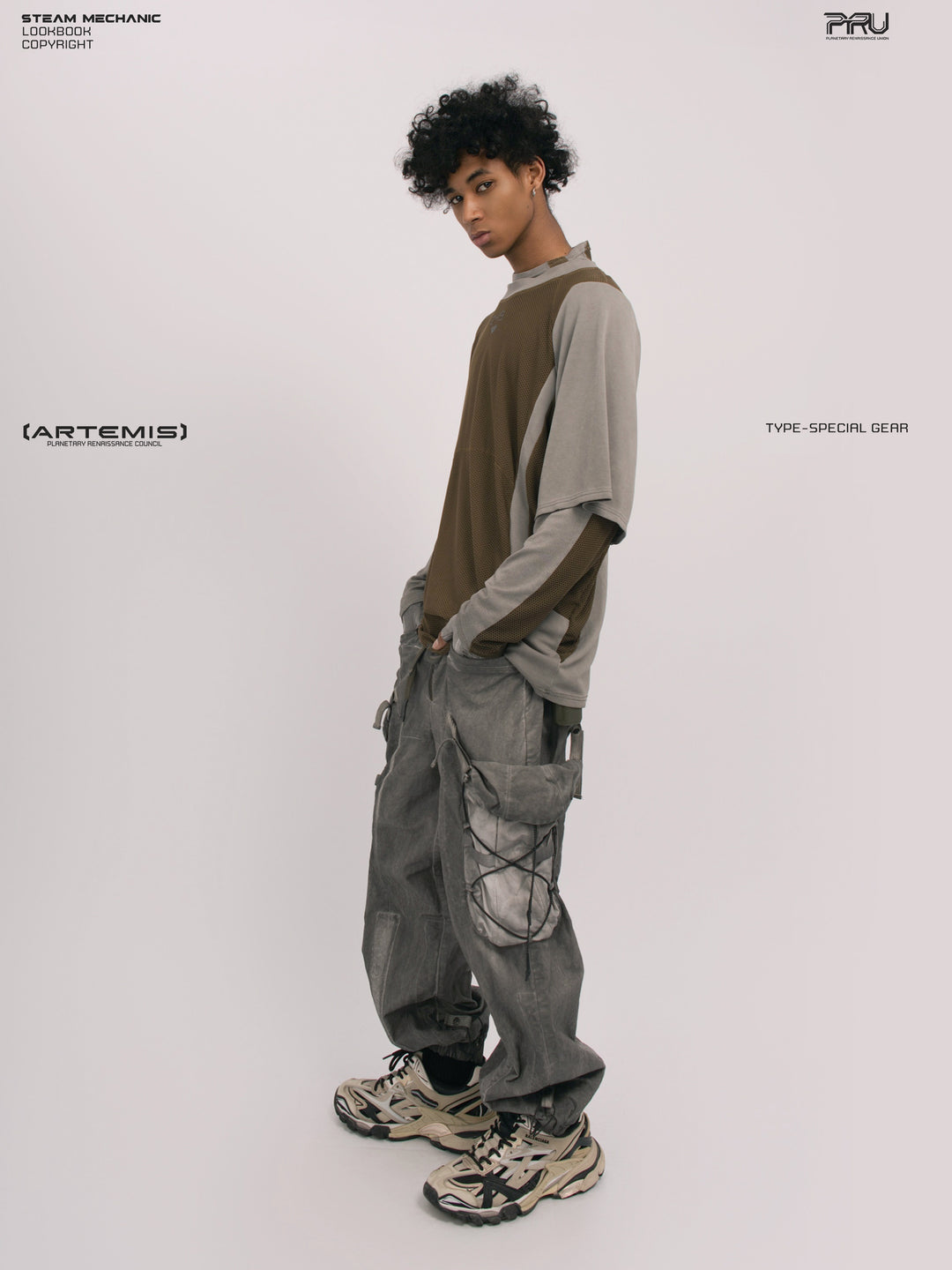 STARFIELD WELDER steel tundra distressed mesh tee — full-length side view layered over a long-sleeve top