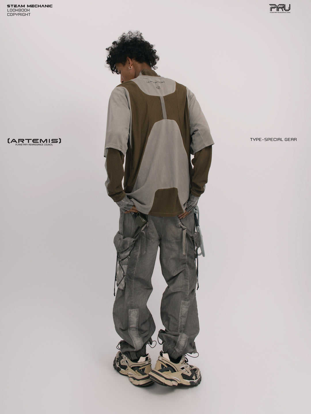 STARFIELD WELDER steel tundra distressed mesh tee — full-length rear three-quarter view showing the layered styling