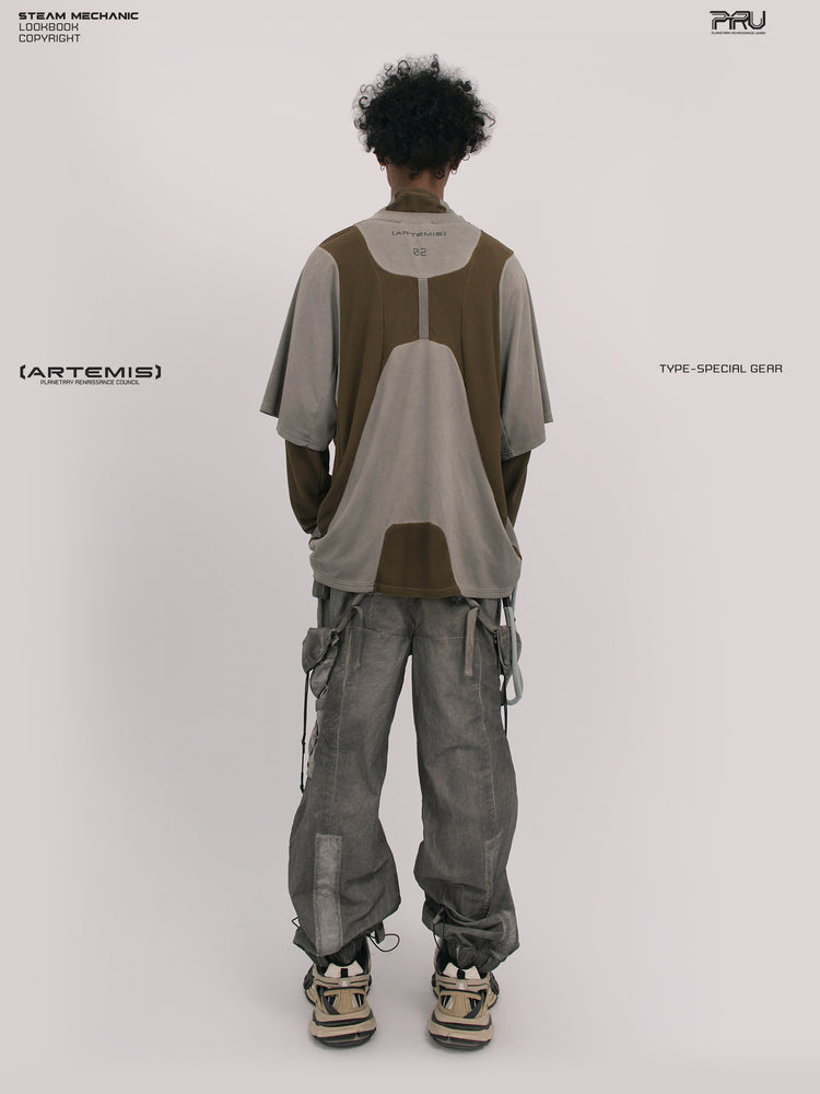 STARFIELD WELDER steel tundra distressed mesh tee — full-length straight back view with a long-sleeve layer