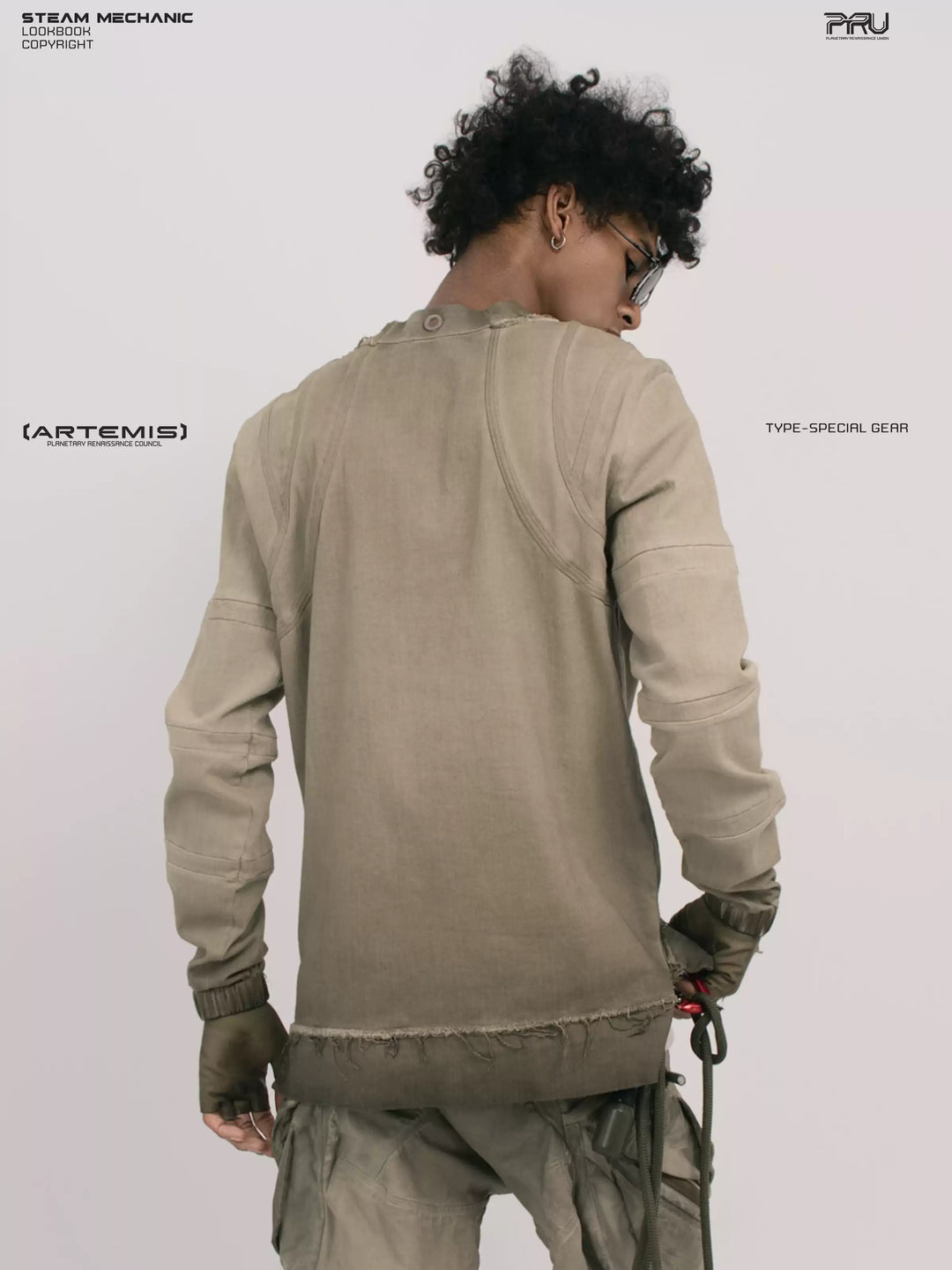 CHAOS ERA xirang brown raw-edge long-sleeve top — rear modeled close-up showing shaped shoulder panels