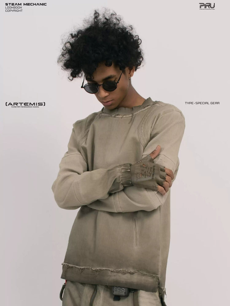 CHAOS ERA xirang brown raw-edge long-sleeve top — front modeled close-up with arms folded