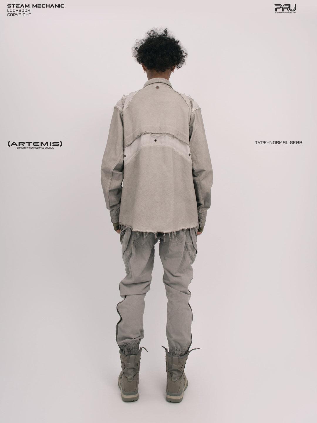 CHAOS ERA nightfall gray raw-edge technical shirt — nightfall gray full back modeled view showing the geometric rear panels and raw-edge seams