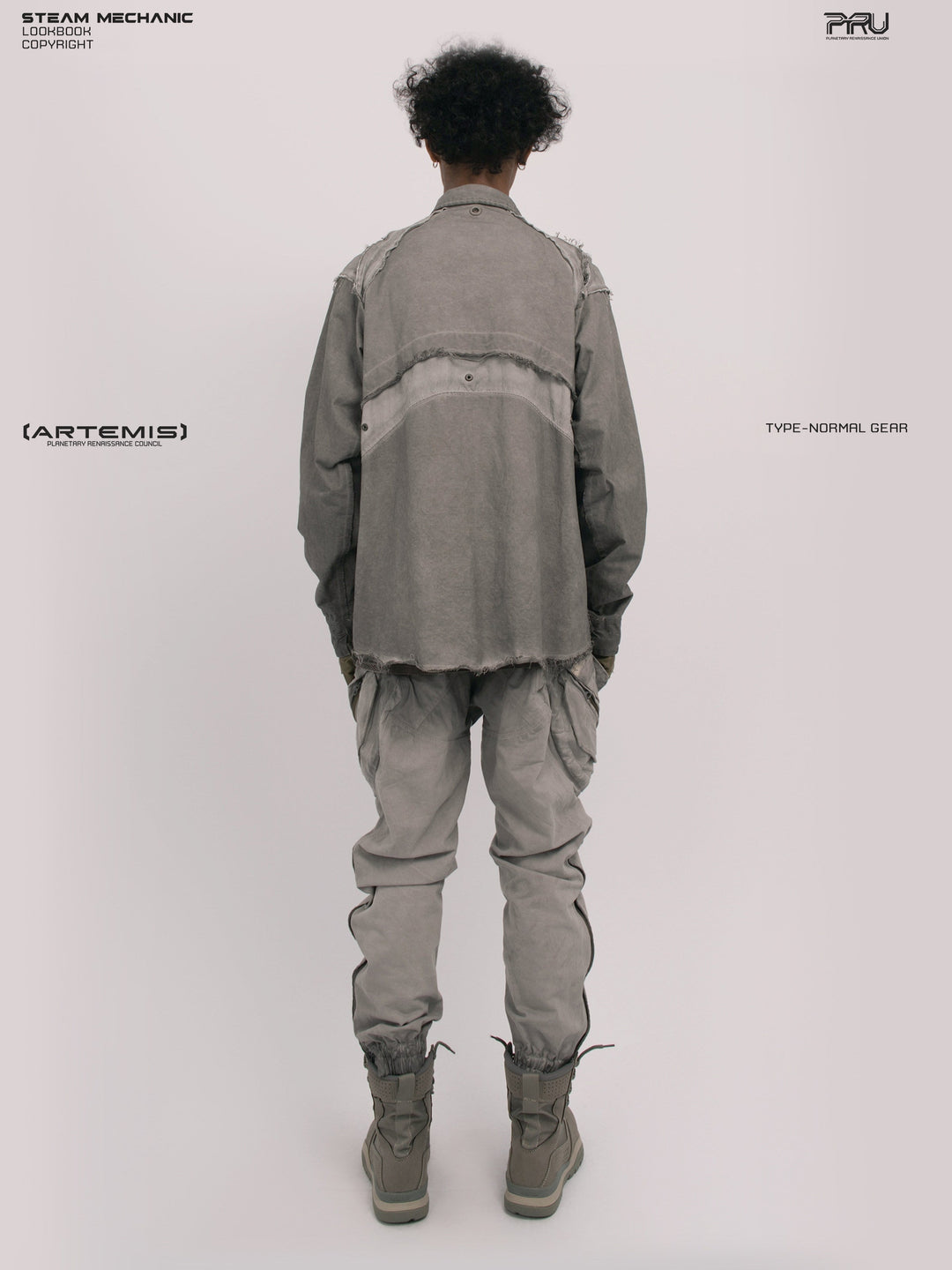 CHAOS ERA moon dust gray raw-edge technical shirt — moon dust gray full back modeled view showing the geometric rear panels and raw-edge seams
