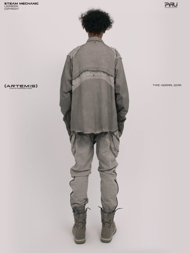 CHAOS ERA moon dust gray raw-edge technical shirt — moon dust gray full back modeled view showing the geometric rear panels and raw-edge seams