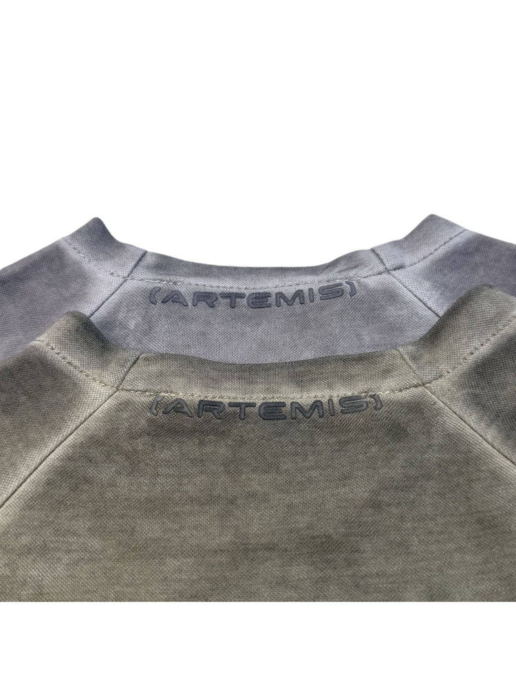TWIN STAR meteor gray stretch riding base-layer top — close-up of both colorways showing the ARTEMIS back-neck marks