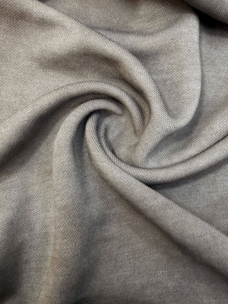 TWIN STAR meteor gray stretch riding base-layer top — close-up of the gray knit fabric drape