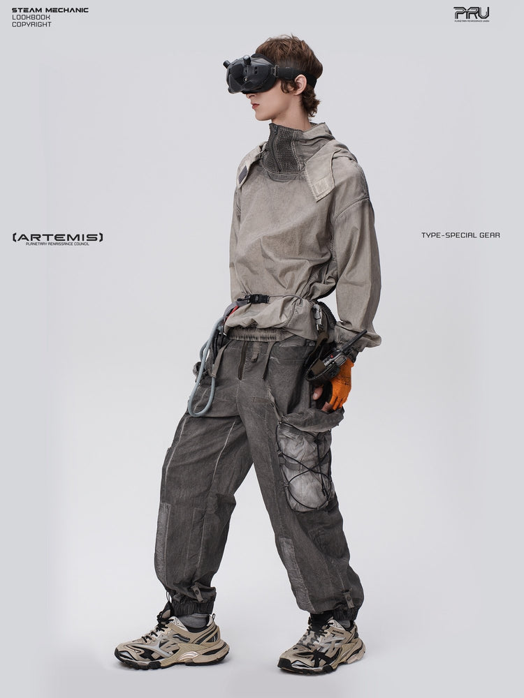 PIONEER detachable waist-pouch cargo pants in meteorite gray — three-quarter full-length view with visor and head raised