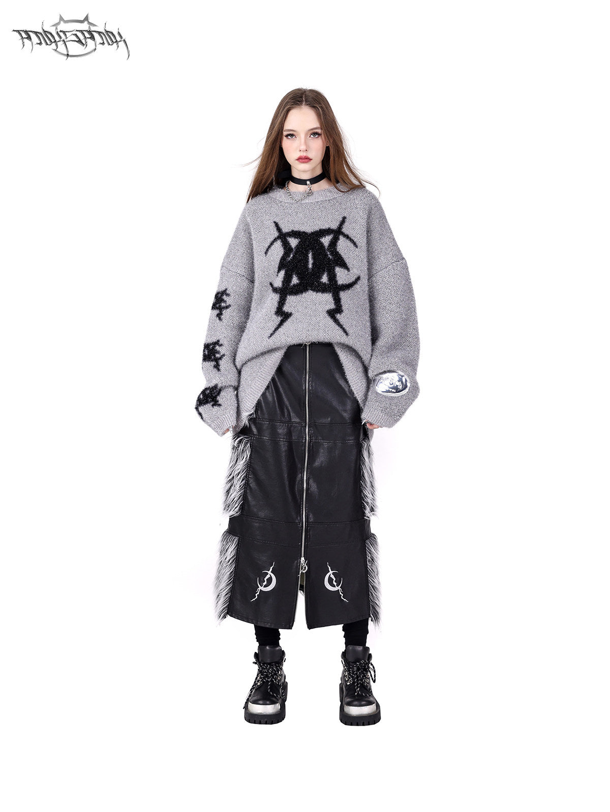 PINKSPINK ELECTRIC MOON two-way faux-fur paneled maxi skirt in black silver — front modeled view with hands in pockets, styled with gray knitwear
