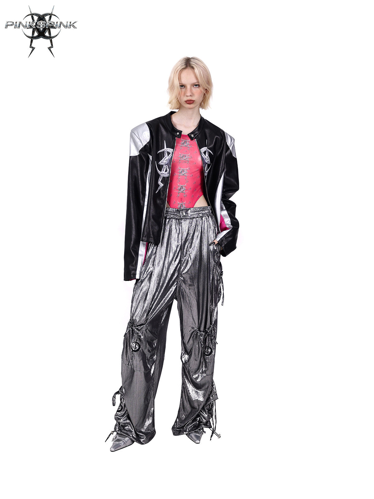 PINKSPINK MIRROR paneled faux-leather moto jacket in black silver pink — full-length front modeled view with the jacket open over metallic trousers
