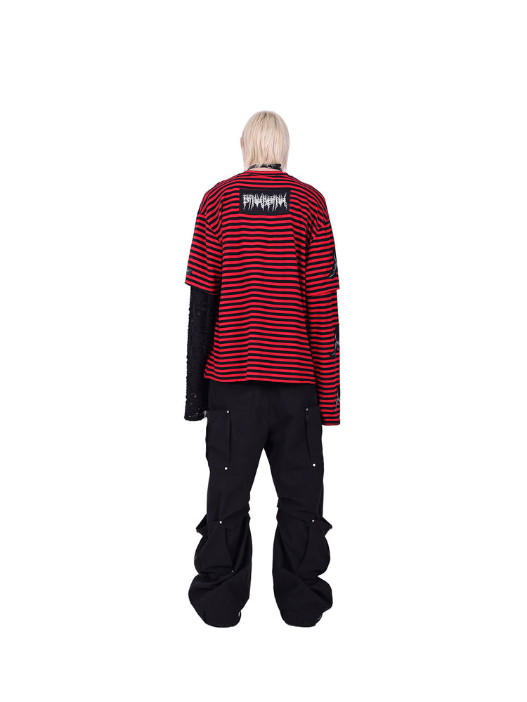 PINKSPINK ELECTRIC MOON striped patchwork long-sleeve tee — red and black full-length back modeled view showing the brand patch