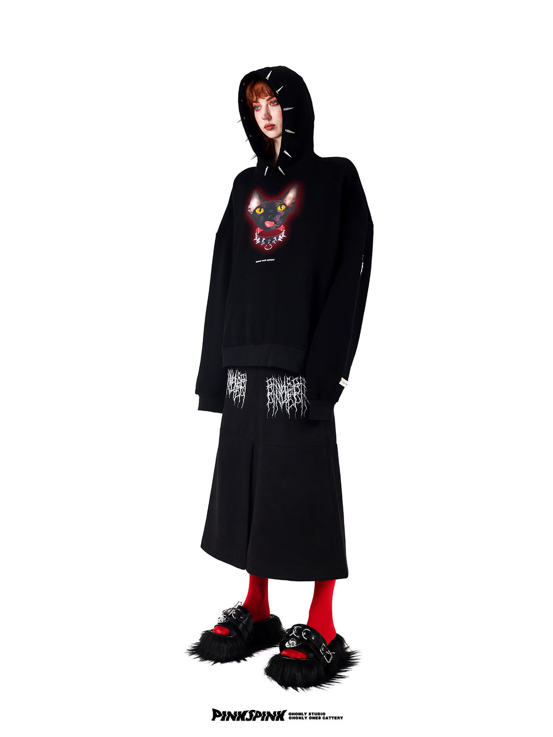 PINKSPINK ELECTRIC THORN embroidered suede-look midi skirt — black angled view styled with a hooded sweatshirt