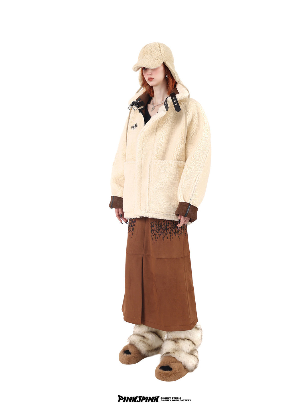 PINKSPINK ELECTRIC THORN embroidered suede-look midi skirt — caramel brown side-angled view styled with a cream jacket