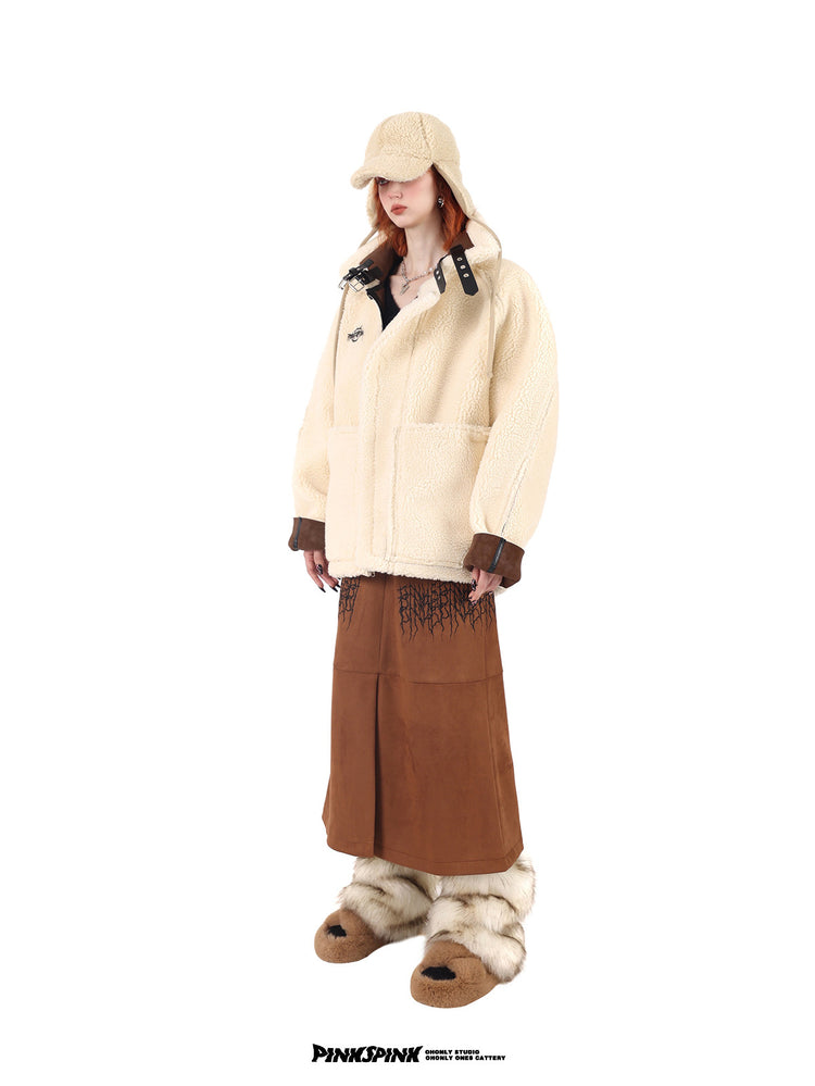 PINKSPINK ELECTRIC THORN embroidered suede-look midi skirt — caramel brown side-angled view styled with a cream jacket