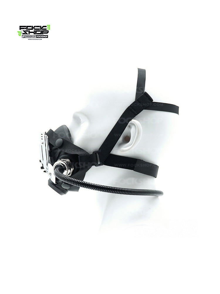 FOCKSHOP NORTH II black modular cyber mask — mask-only side view on the original white display head, showing straps and tube placement