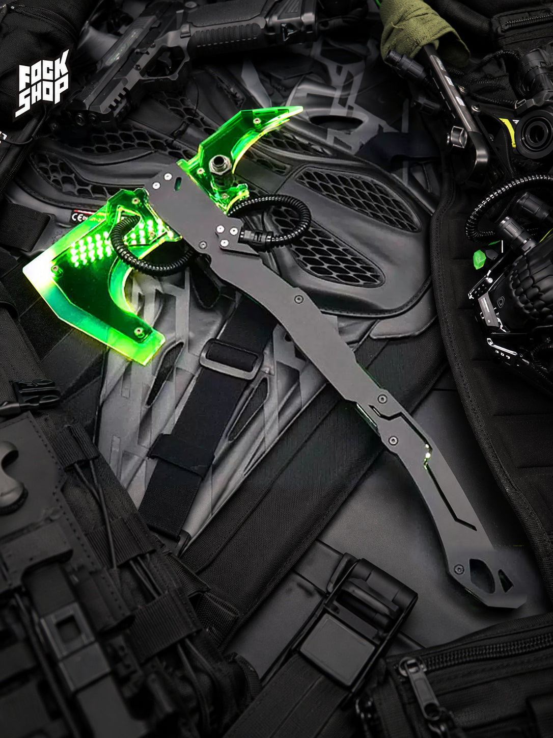 FOCKSHOP SHANHAI illuminated axe prop — illuminated green prop resting diagonally on black costume equipment