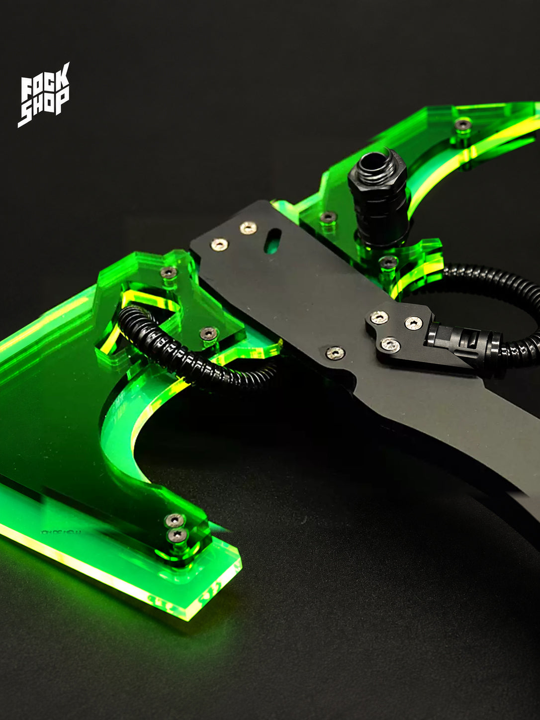 FOCKSHOP SHANHAI illuminated axe prop — green translucent head close-up with exposed fasteners and black fittings