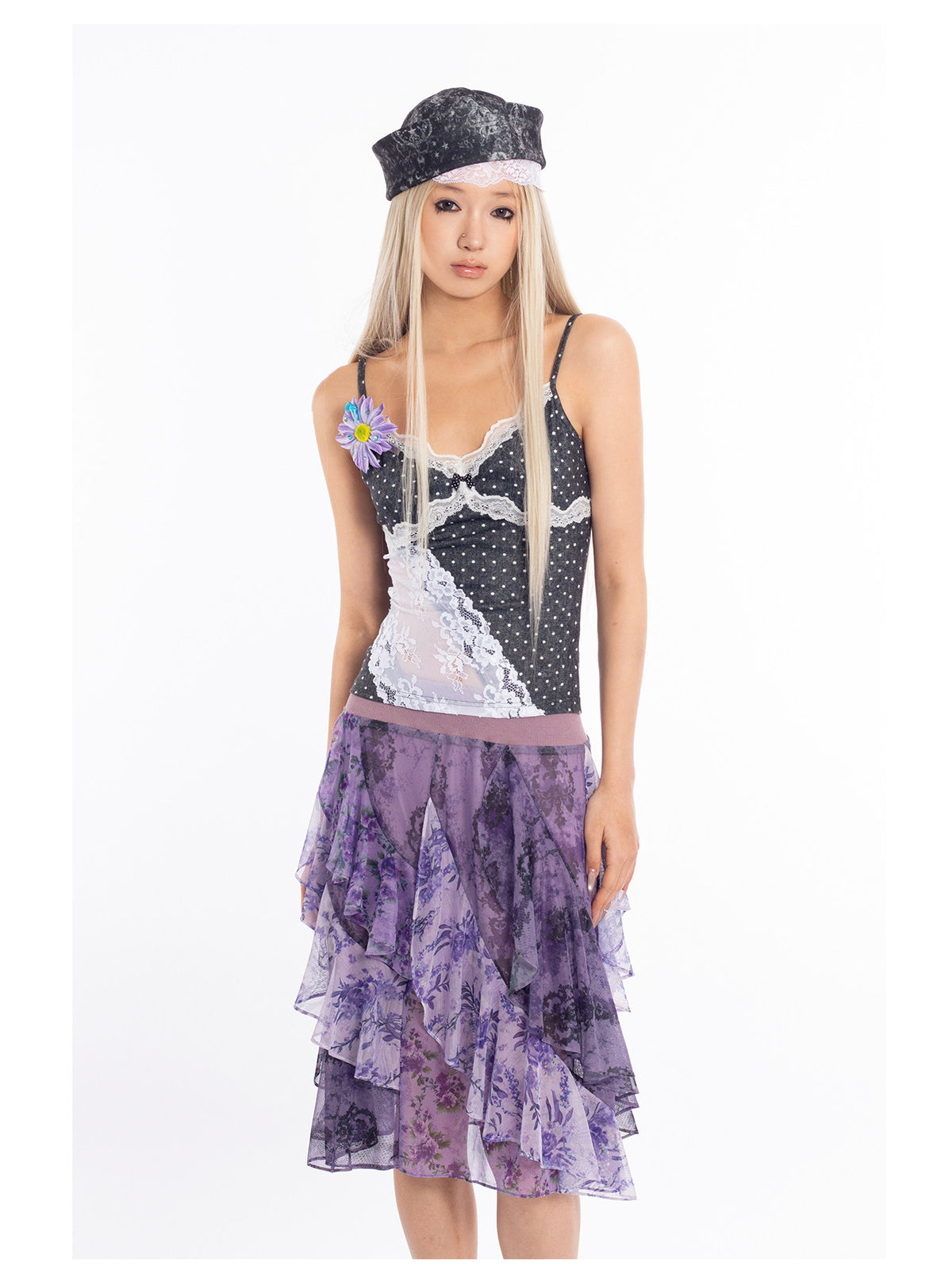4RE1GN PURPLE HAZE asymmetric ruffle skirt in purple — close front modeled view showing the asymmetric layers