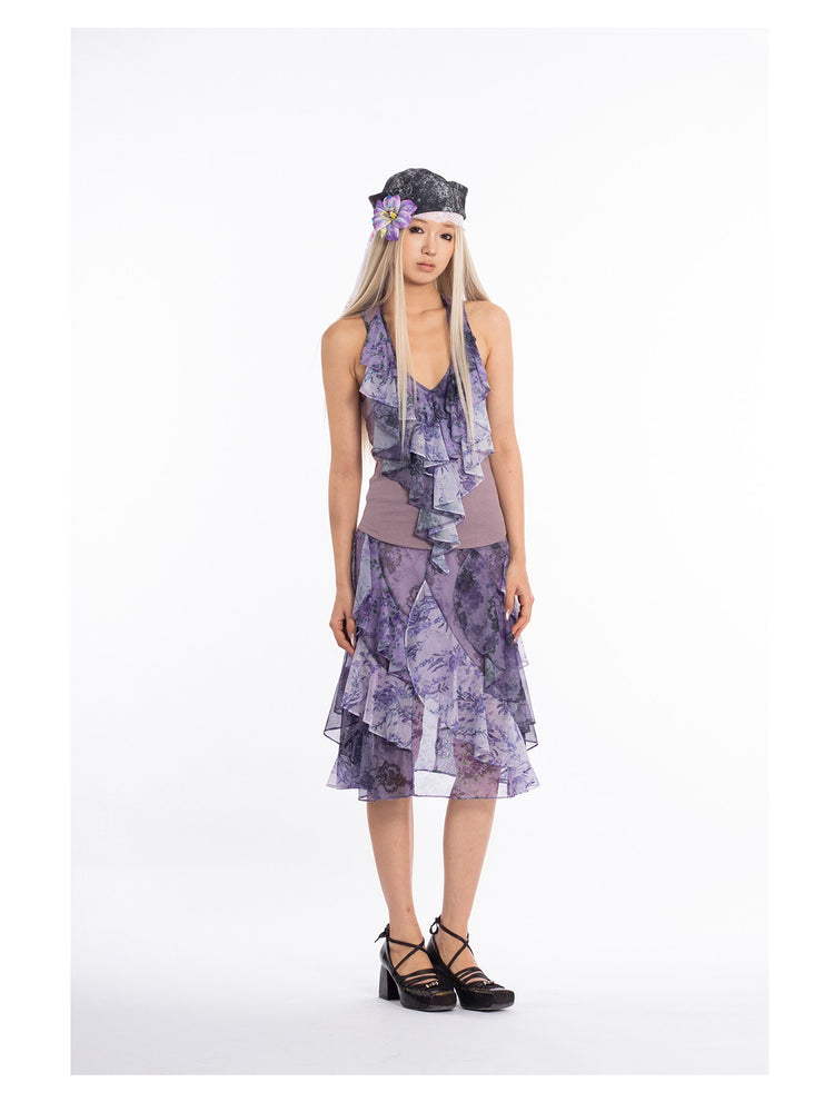 4RE1GN PURPLE HAZE asymmetric ruffle skirt in purple — front modeled view with arms down