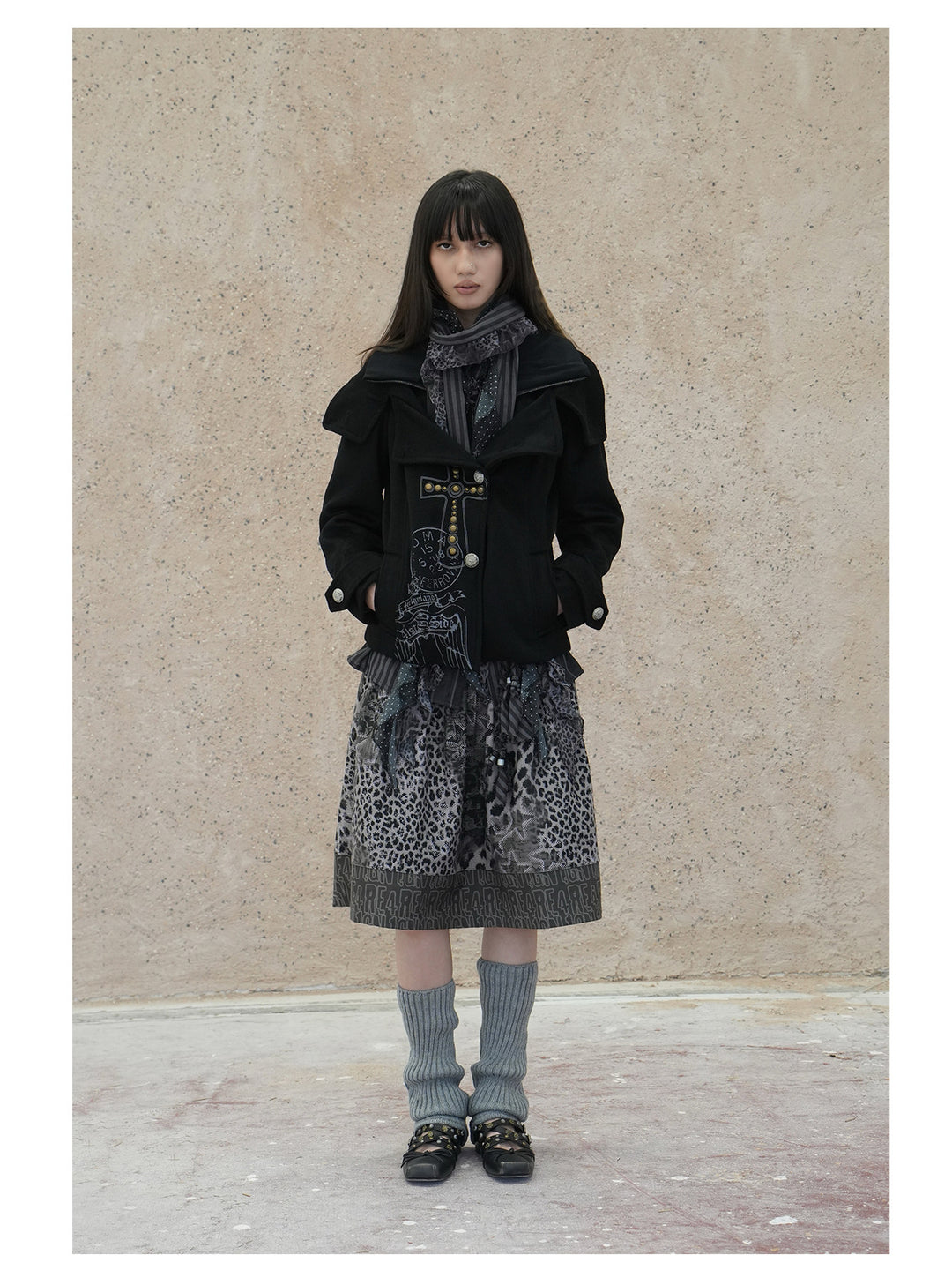 4RE1GN CROSS layered high-neck wool-blend jacket in black — full-length front modeled view with the neckline open and hands in pockets