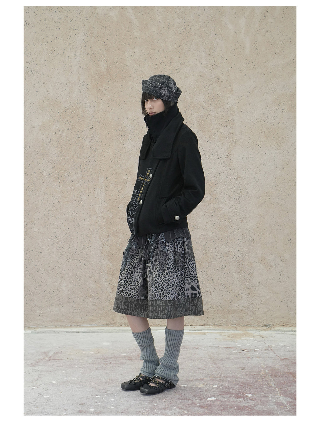4RE1GN CROSS layered high-neck wool-blend jacket in black — full-length three-quarter modeled view with the inner neck zipped up