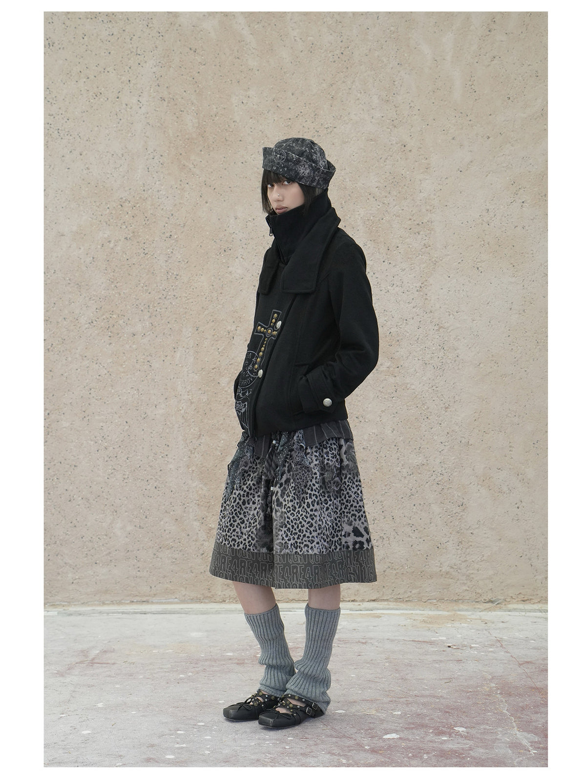 4RE1GN CROSS layered high-neck wool-blend jacket in black — full-length three-quarter modeled view with the inner neck zipped up