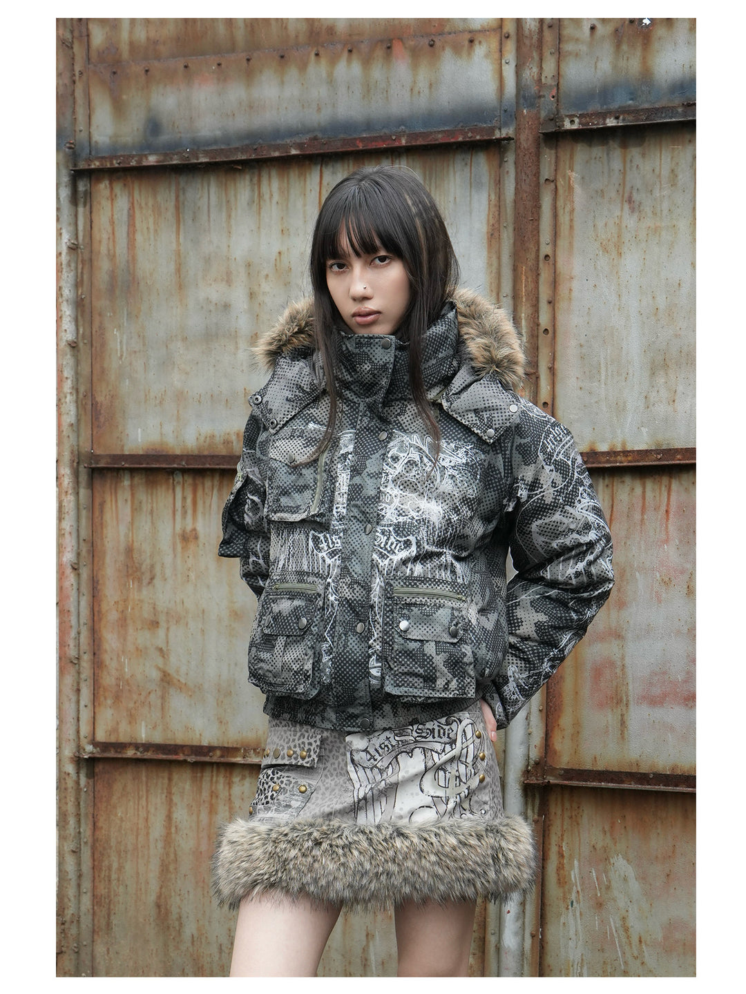 4RE1GN STAR CAMO hooded down jacket in gray green — three-quarter front modeled view with the hood down