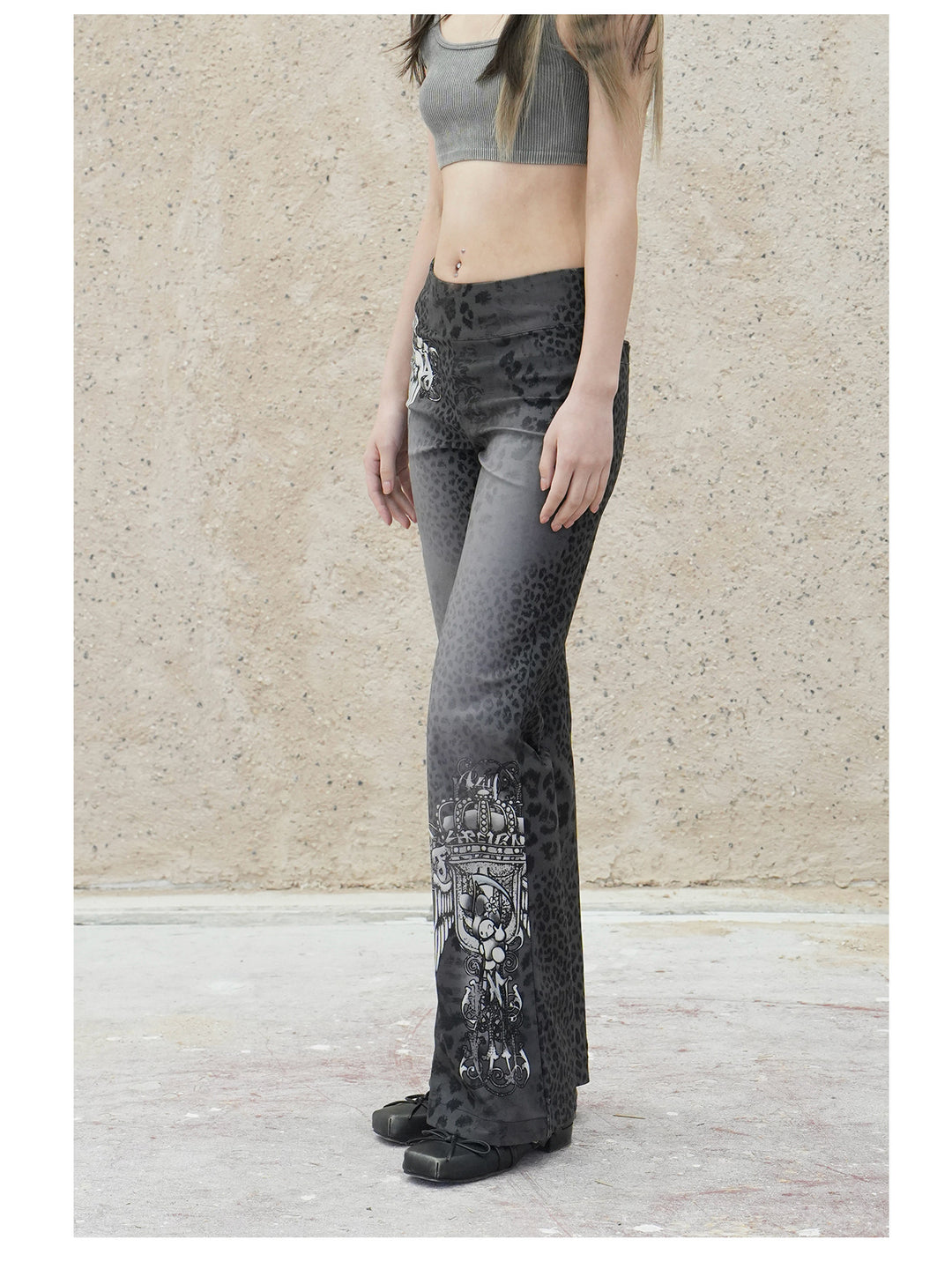 4RE1GN PANTHER crest-print corduroy flare pants in gray black — three-quarter modeled view showing the slim fit