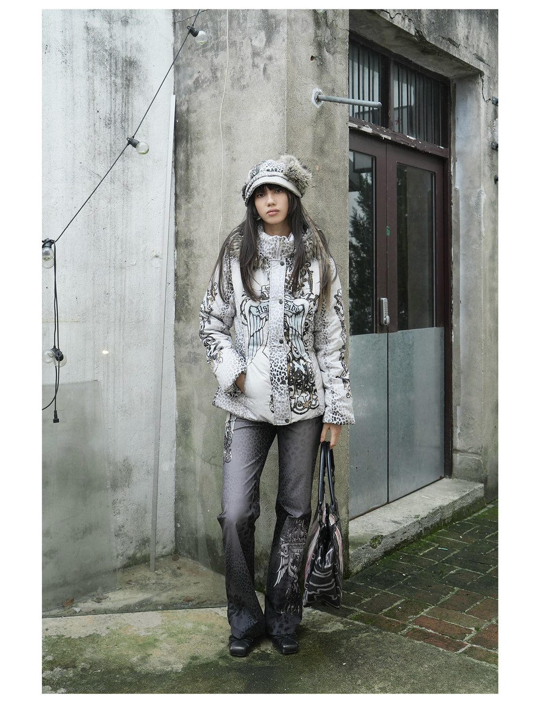 4RE1GN PANTHER crest-print corduroy flare pants in gray black — front modeled view styled with a white printed jacket