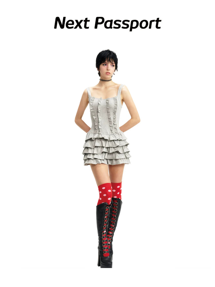 NEXT PASSPORT gray tiered ruffle mini dress — front and three-quarter full-look hero views.