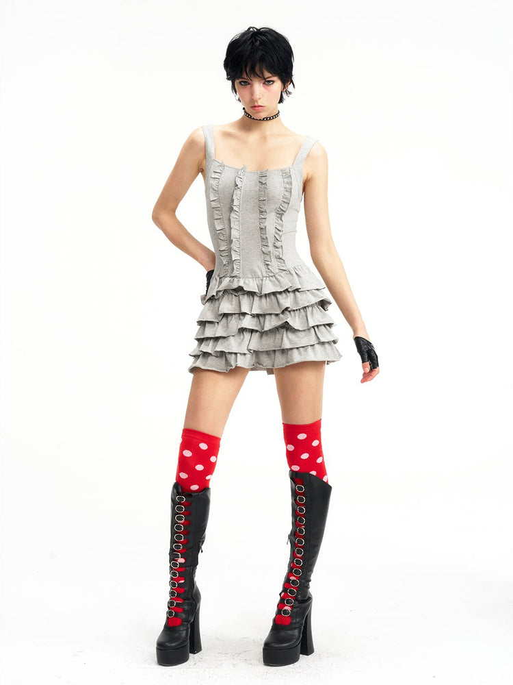 Gray tiered mini dress, side styling view