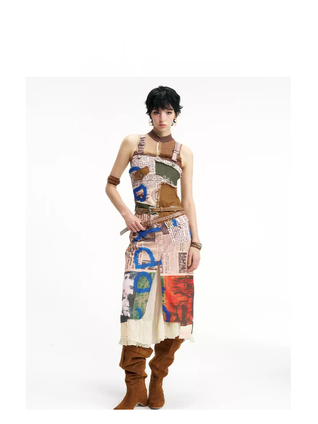 NEXT PASSPORT newspaper-print slit suspender dress — front full-look hero view.