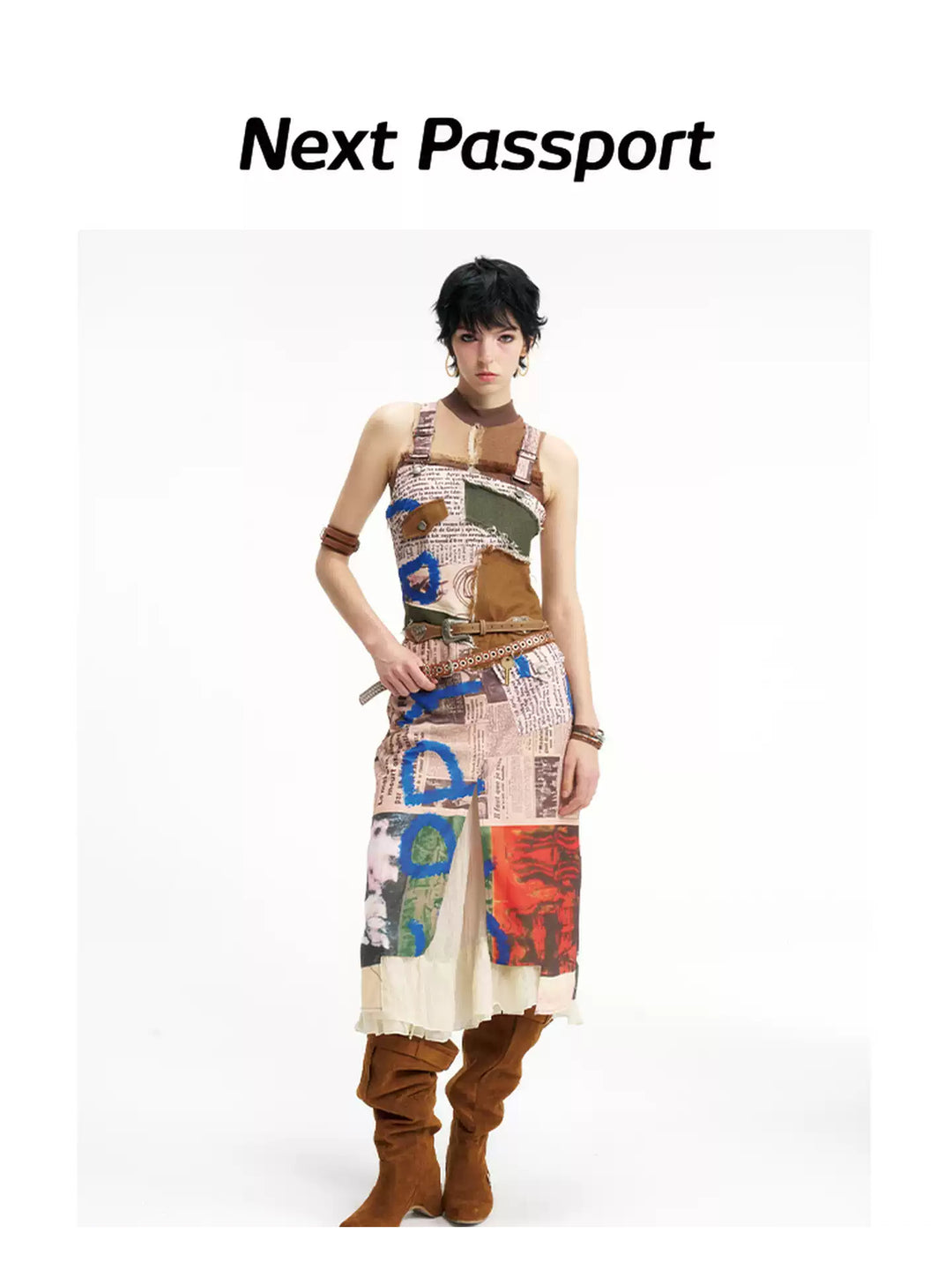 NEXT PASSPORT newspaper-print slit suspender dress — front full-look hero view.