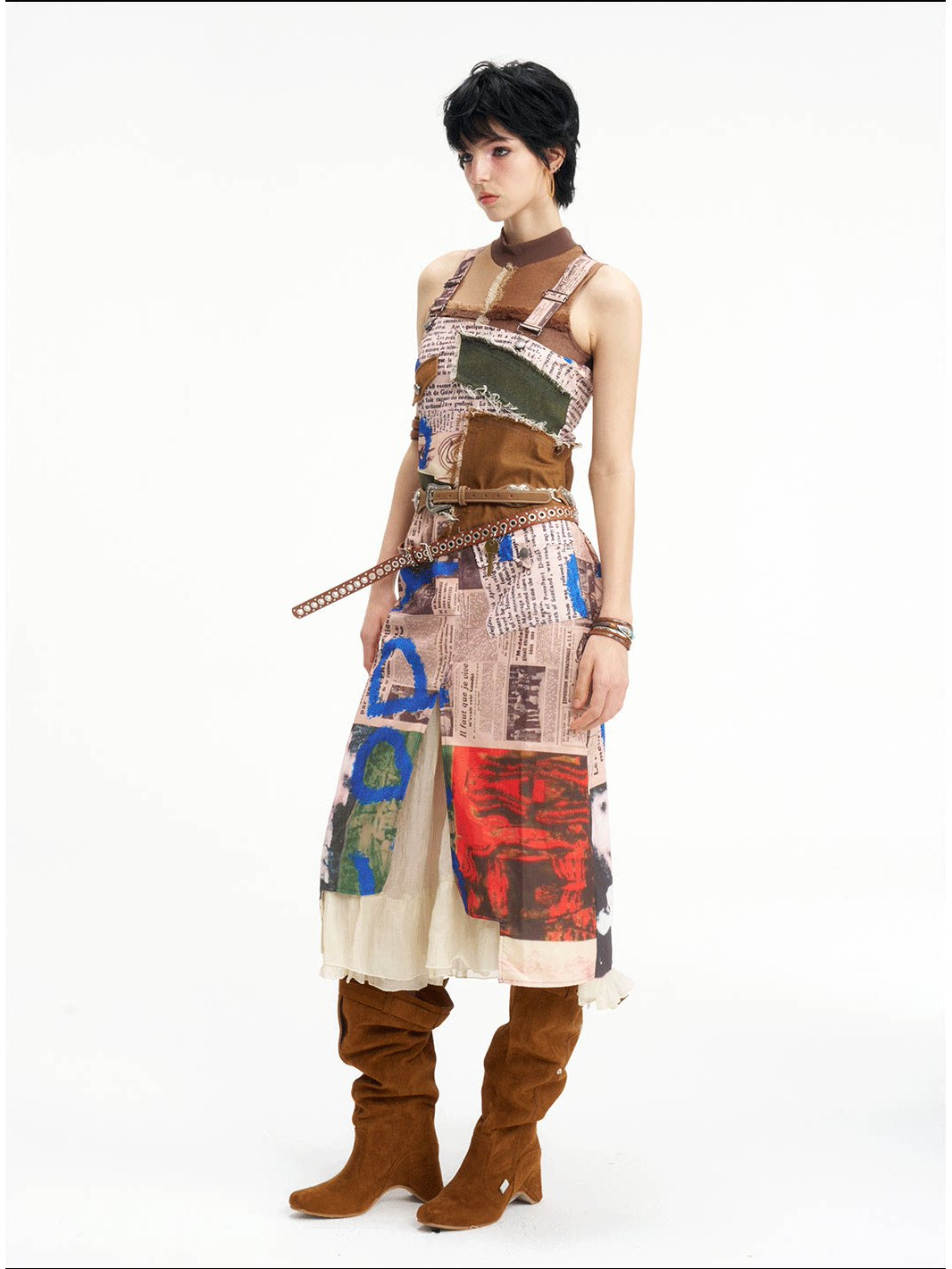 NEXT PASSPORT newspaper-print slit suspender dress — side three-quarter full-length view.