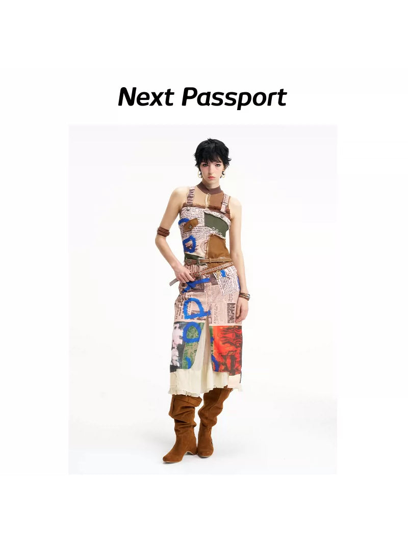 NEXT PASSPORT newspaper-print slit suspender dress — styled front full-look view.